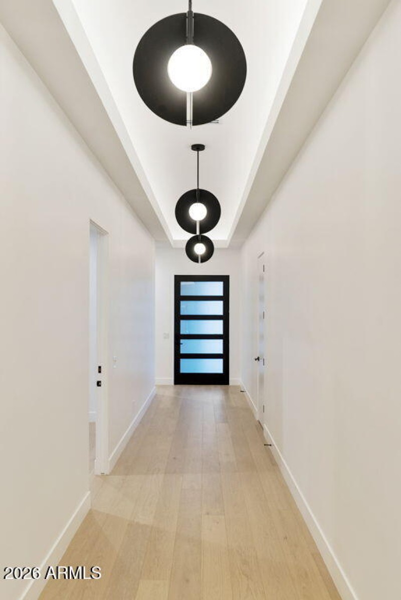 Foyer With Designer Lights & Cove Lighti