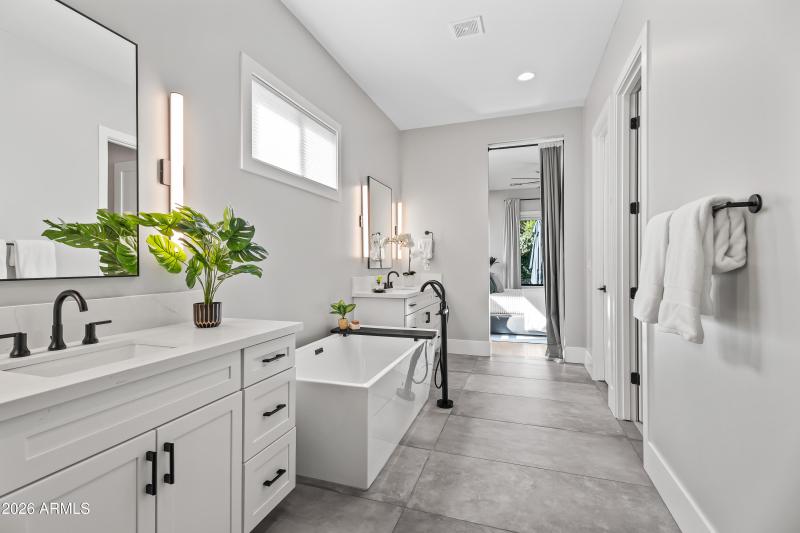 Primary Bath features soaking tub