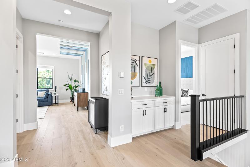 Sprawling upstairs landing with storage