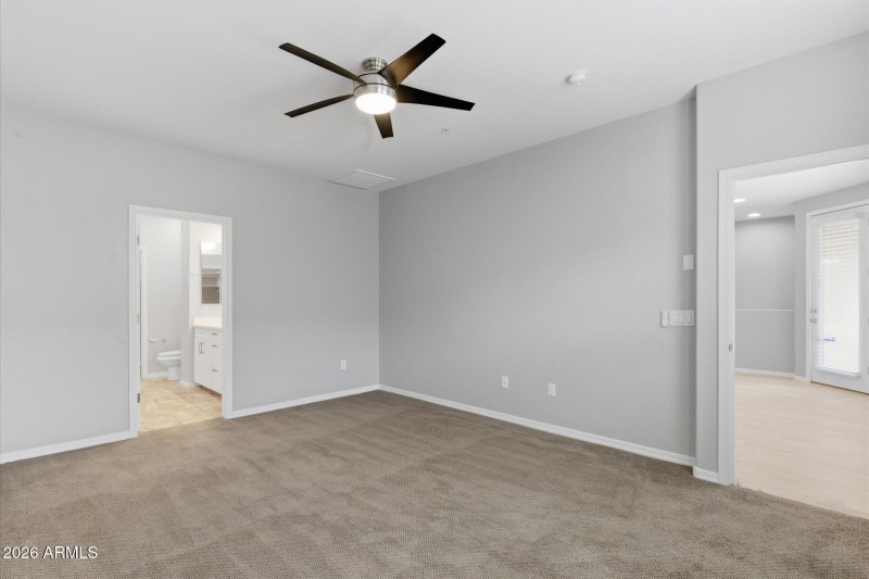 Primary Bedroom to Entry and Bathroom