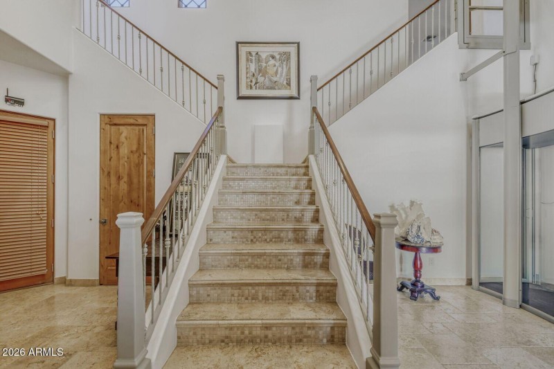 Dual Stairway to Bedroom Suites