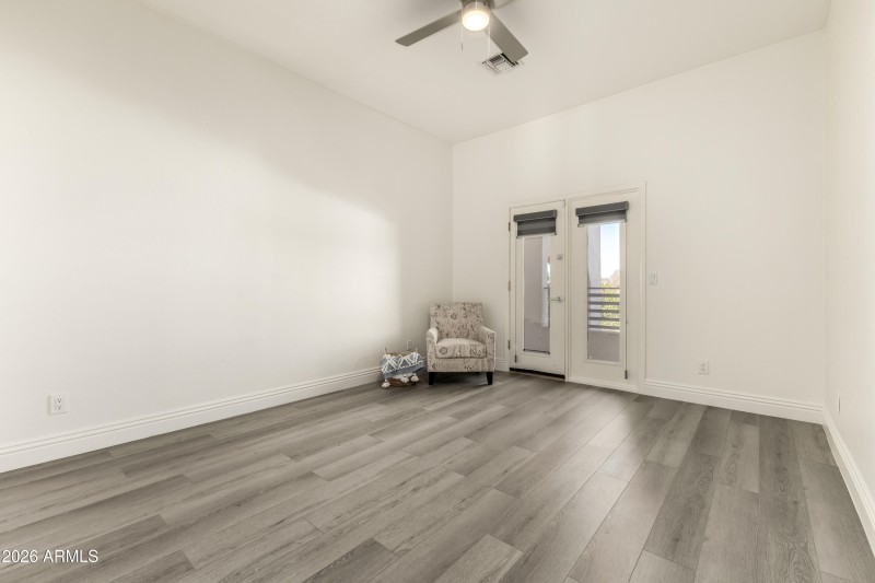 Upstairs second bedroom with balcony