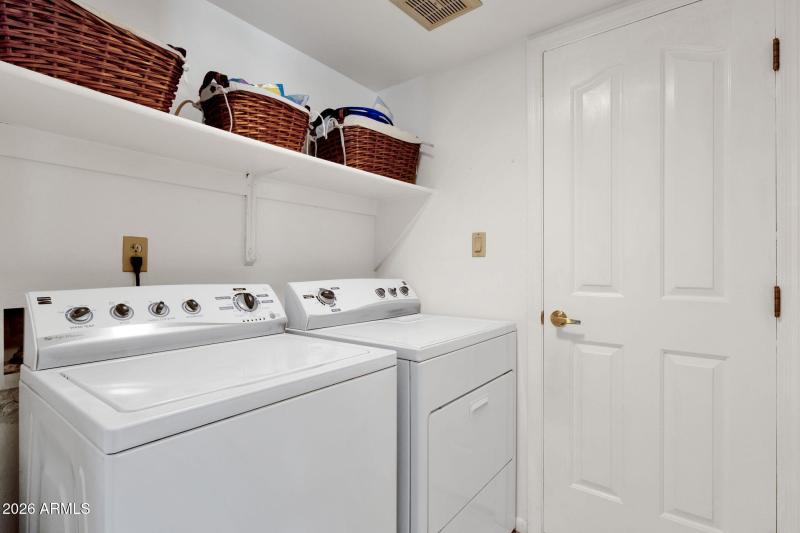 Laundry Room with Storage Closet