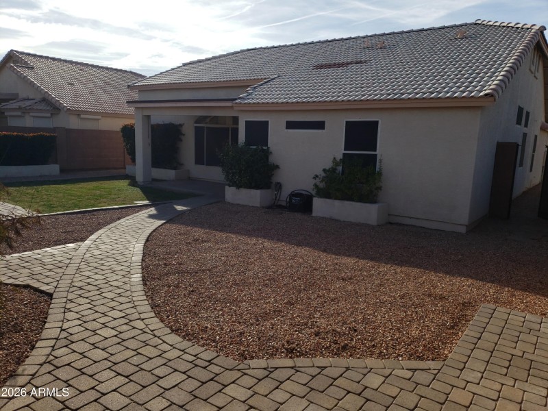 Backyard with Grass & Pavers