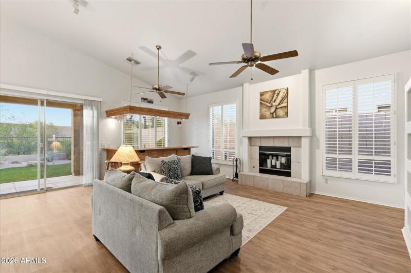 FR w Fireplace & Backyard Views