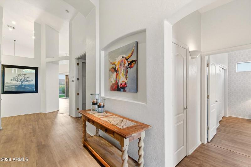 Hallway w Art Niche & Tall Ceilings