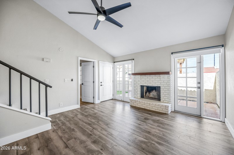 Living Room & Door To Primary Bedroom
