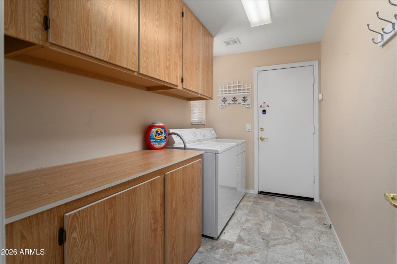 Spacious Laundry with LOTS of Cabinets!