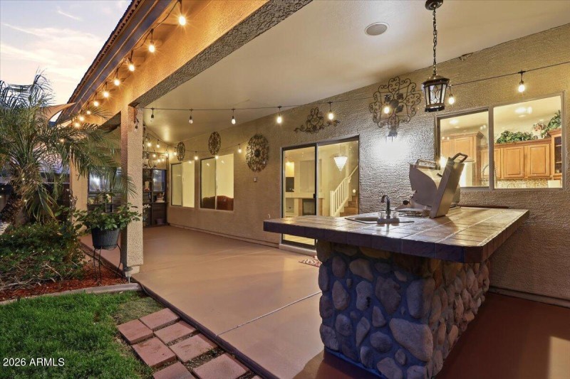 Extended covered patio with TV