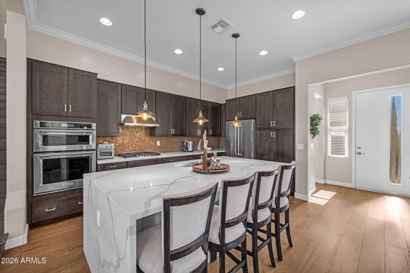 Kitchen with Large Waterfall Island