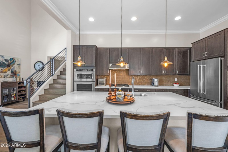 Kitchen with Large Waterfall Island