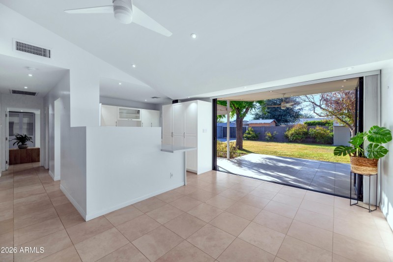 Kitchen adjacent to backyard