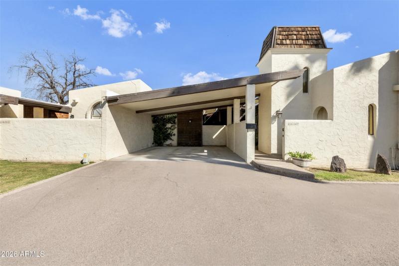 Carport With Hidden Storage Room