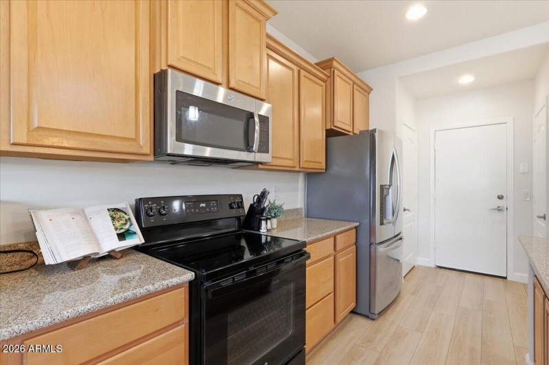 black and stainless appliances