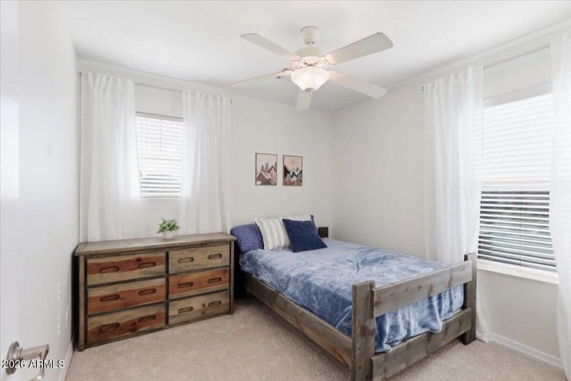 bedroom three walk-in closet