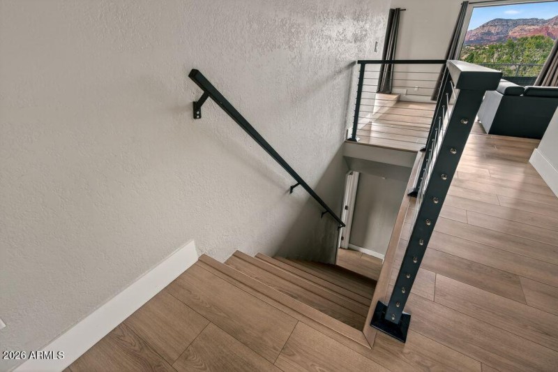 Stairs to 3rd bedroom and laundry