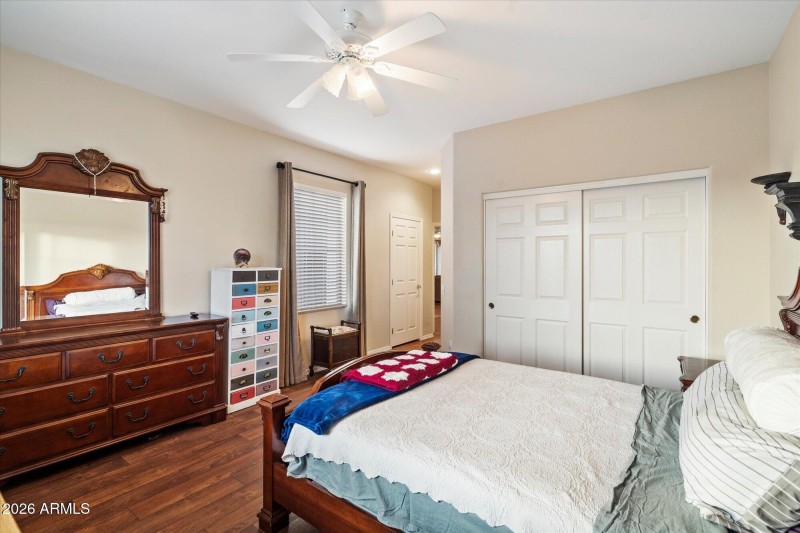 Bedroom w Wood Flooring & Ceiling Fan