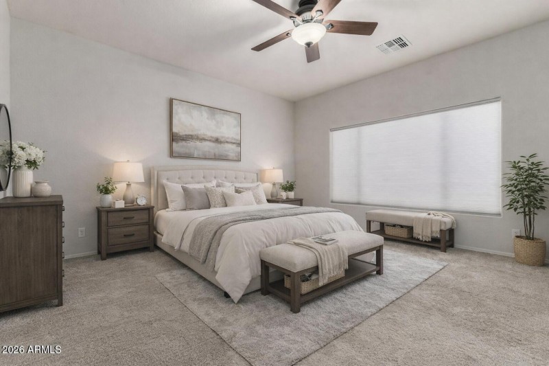 Neutral-toned cozy master bedroom setup