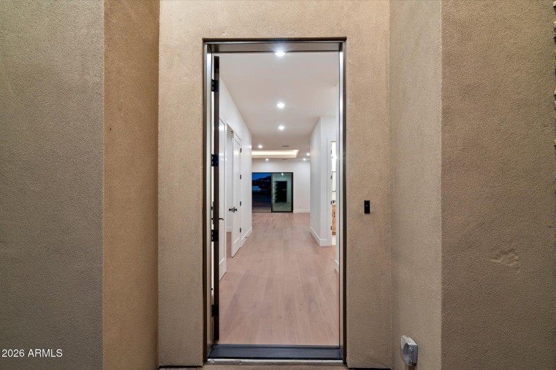Entry w View Into Open Interior Layout