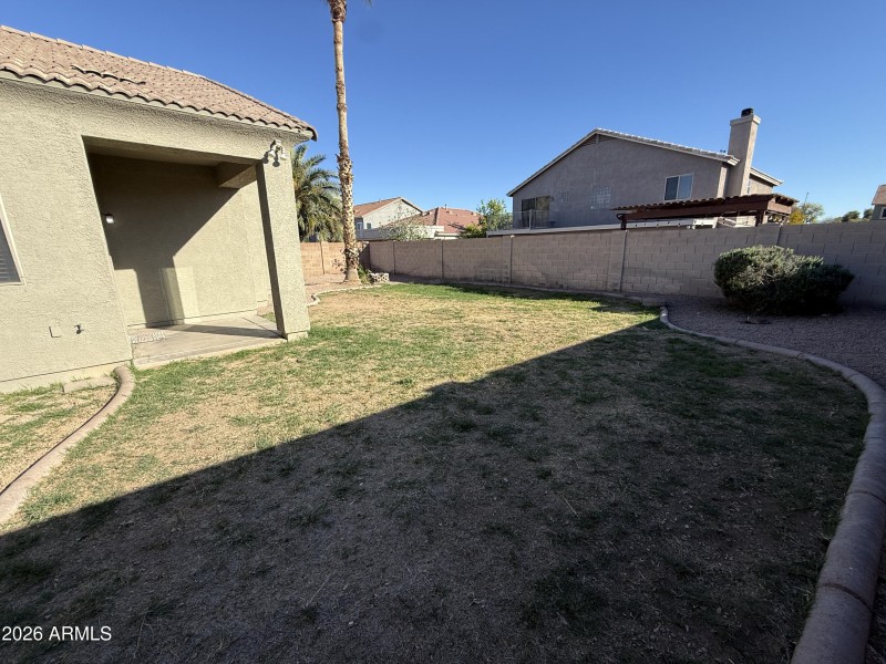 Backyard Lawn & Patio View