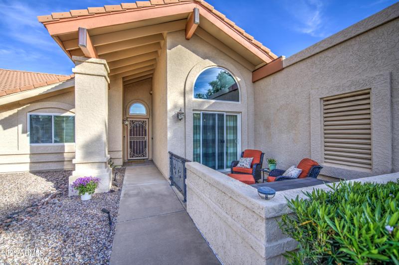 Front with gated patio area