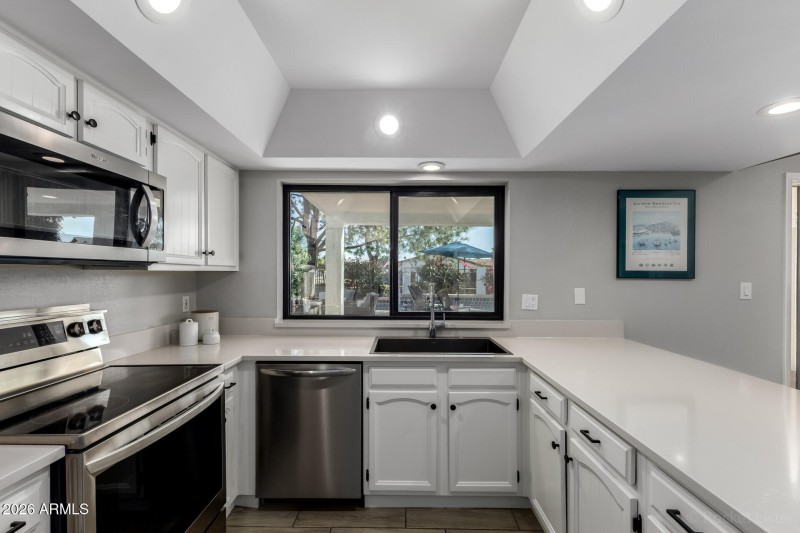 Kitchen w/ new Window to Back
