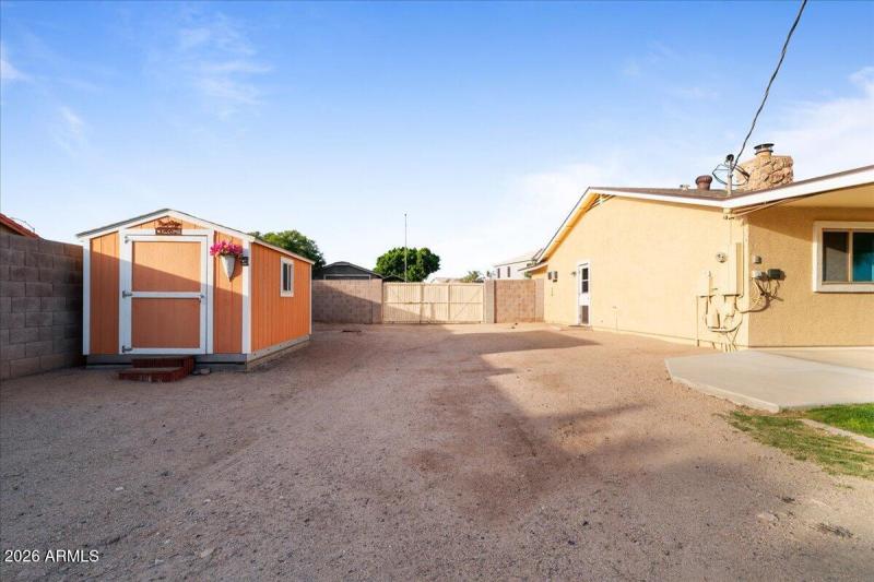 Side Yard with RV Gate and Shed