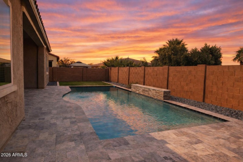 Serene poolside at sunset