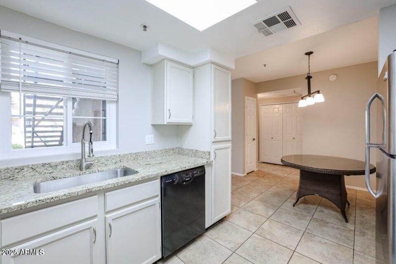 9451 E Becker Ln, 11 1031