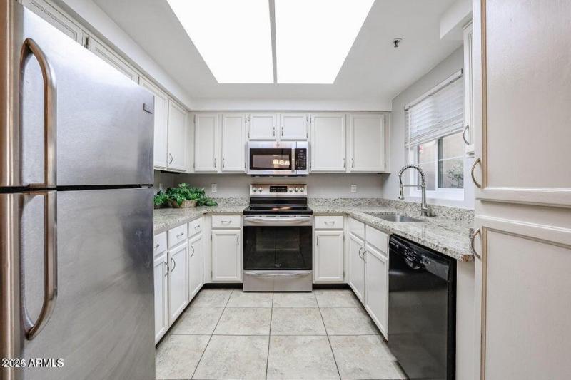 9451 E Becker Ln, 12 1031