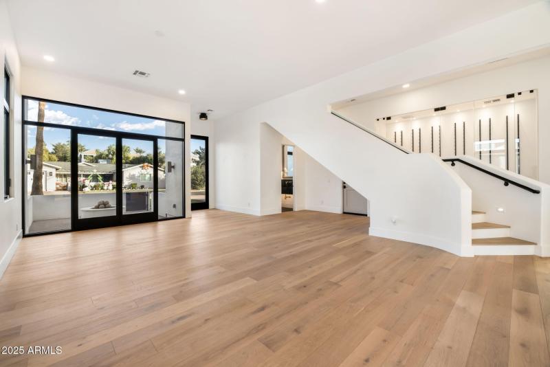 Living room and curved stairs