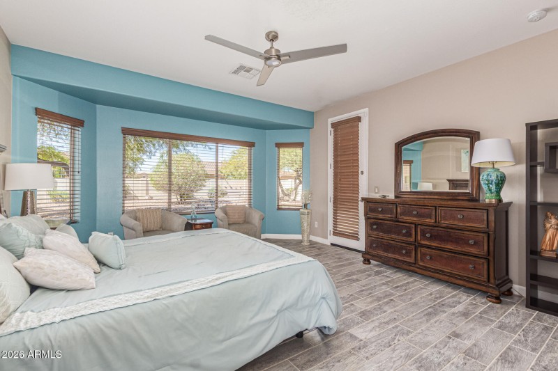 Primary bedroom with door to patio
