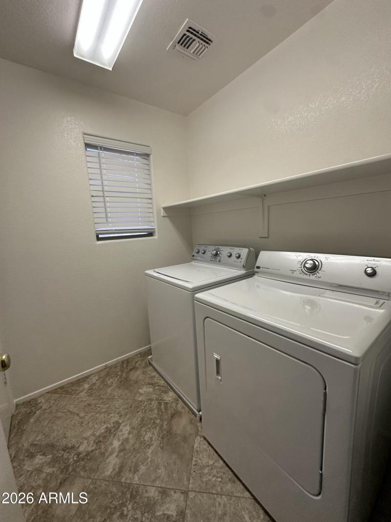 Upstairs Laundry Room with Storage