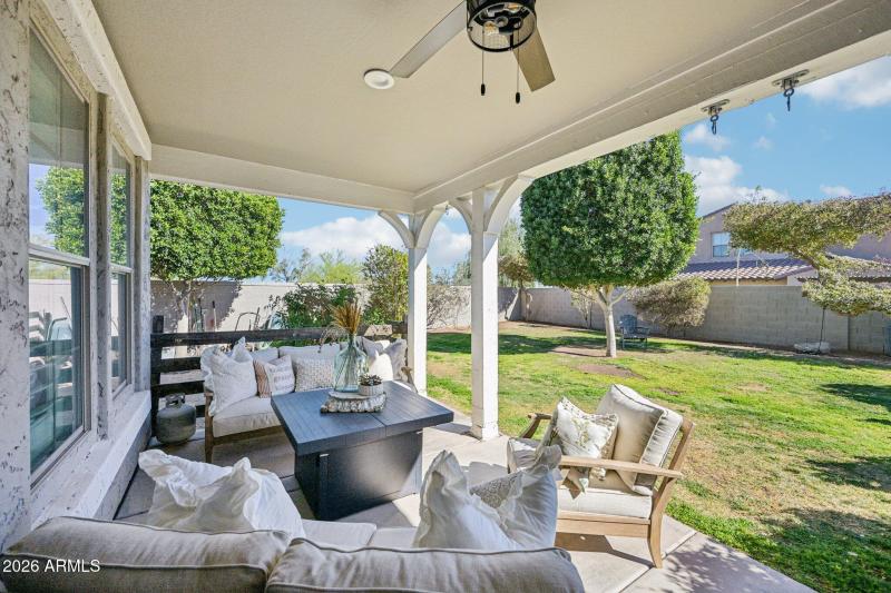 Covered Patio & Grass Backyard
