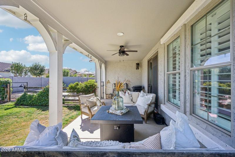 Covered patio and gated pool