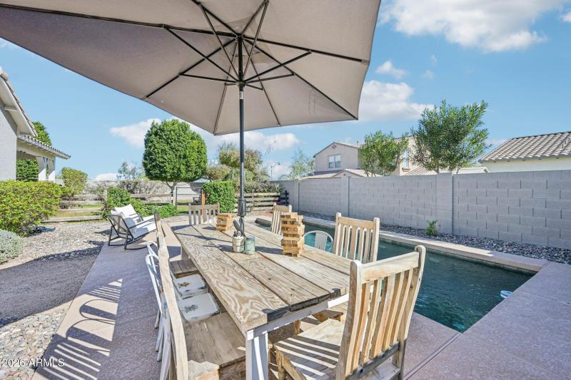 Pool Sundeck and Dining Area