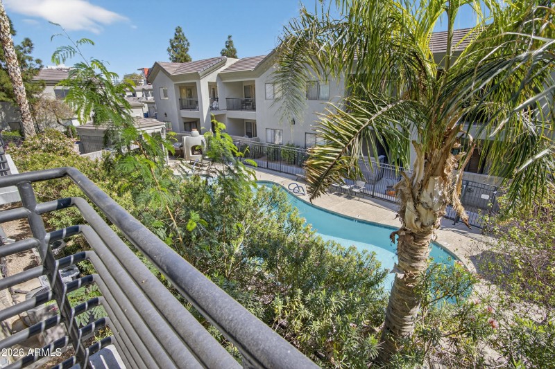 Balcony overlooking community pool