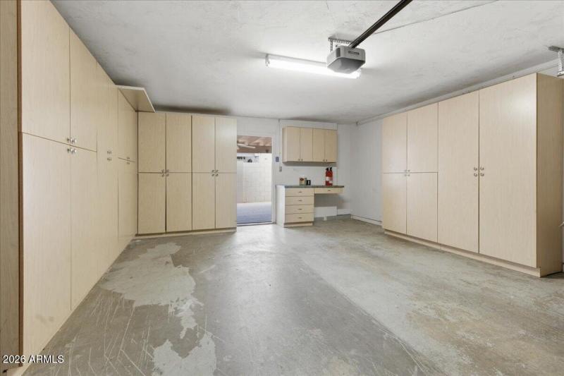 Garage w/ LOTS of Built-In Cabinets!