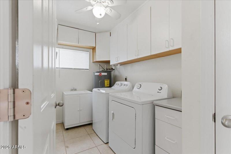 Laundry Room w/ Sink and Pantry Space