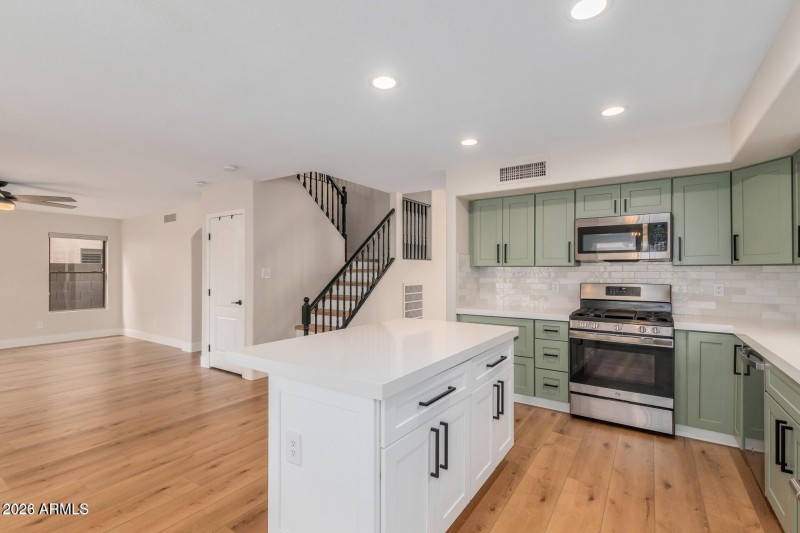 KITCHEN OPEN TO FAMILY ROOM