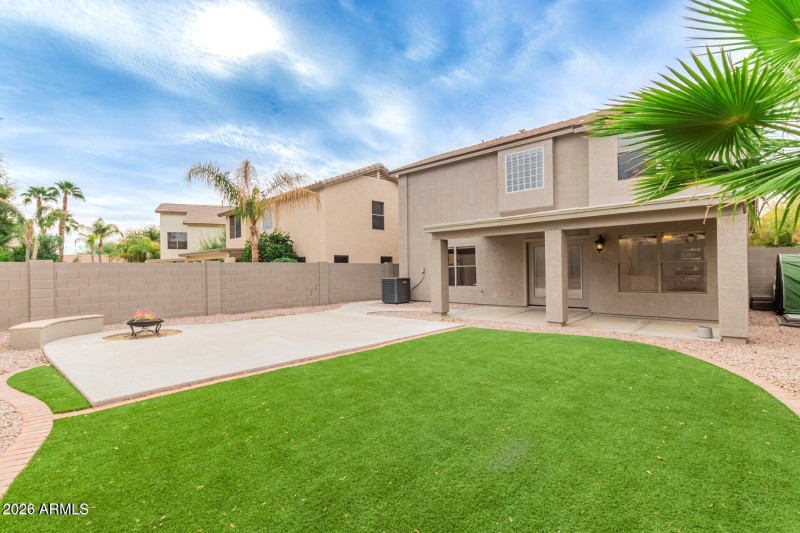 COVERED PATIO AND NICE YARD ARTIFICIAL G