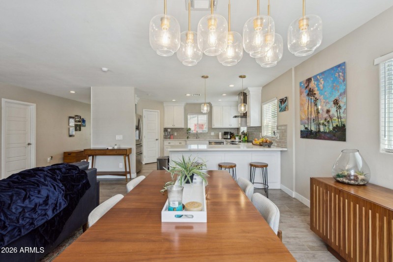 Dining opens to kitchen