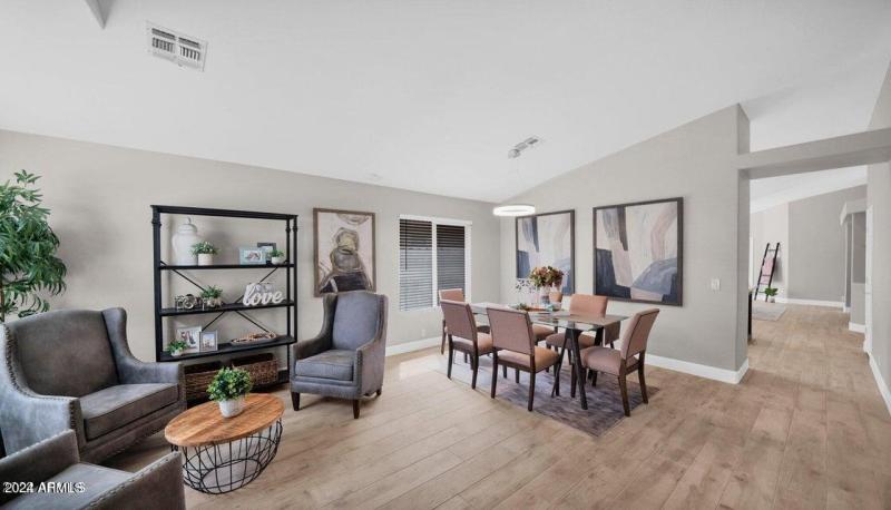 FORMAL LIVING AND DINING AT ENTRANCE