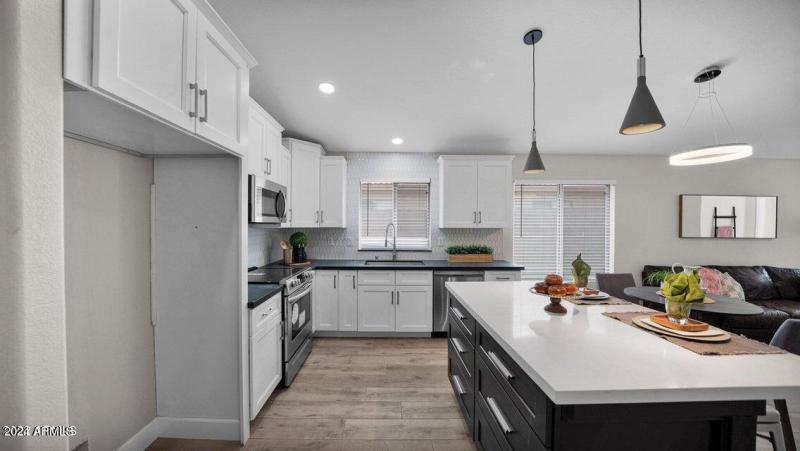 UPGRADED CABINETS AND COUNTERTOPS