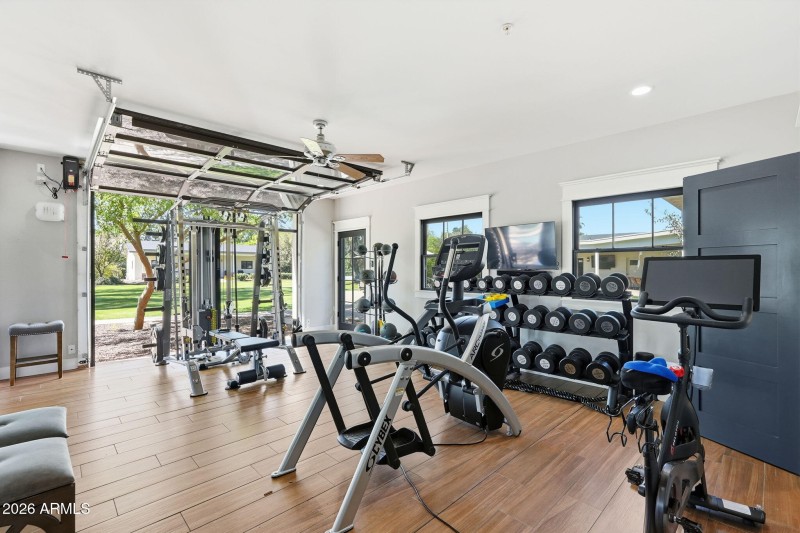 Home Gym with glass garage door