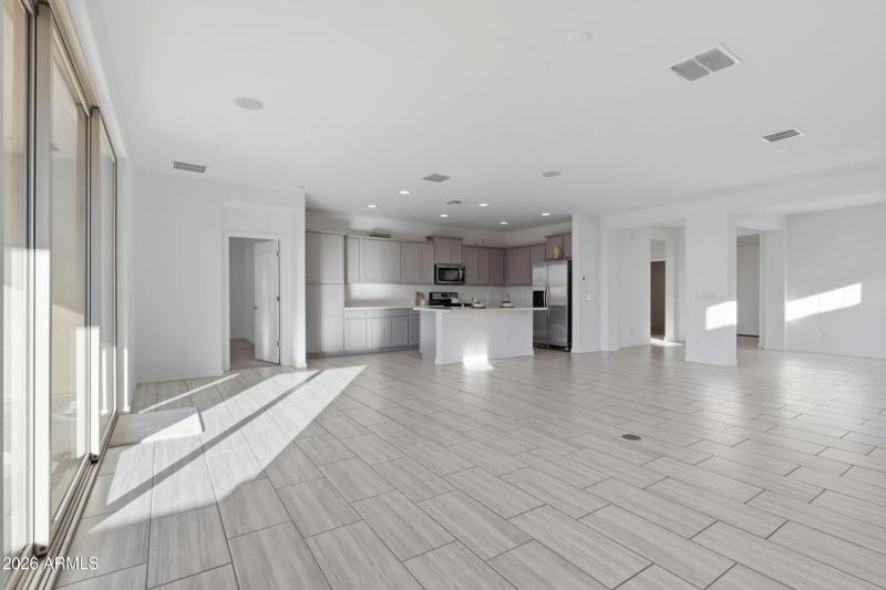 primary bedroom off kitchen