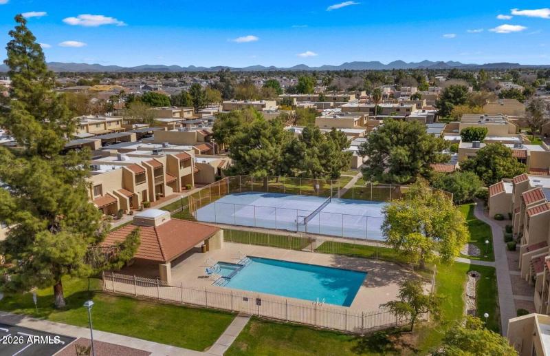 10 - sky view of pool and courts