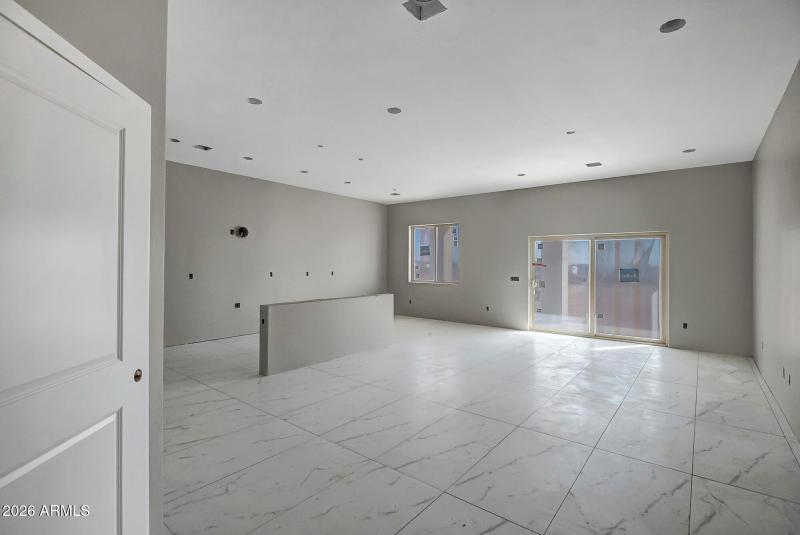 Great room looking onto kitchen