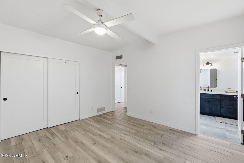 Primary Bedroom & Private Bath