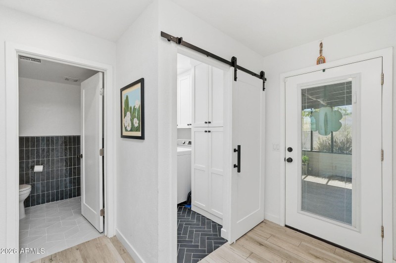 Half Bath, Laundry, & Patio Access